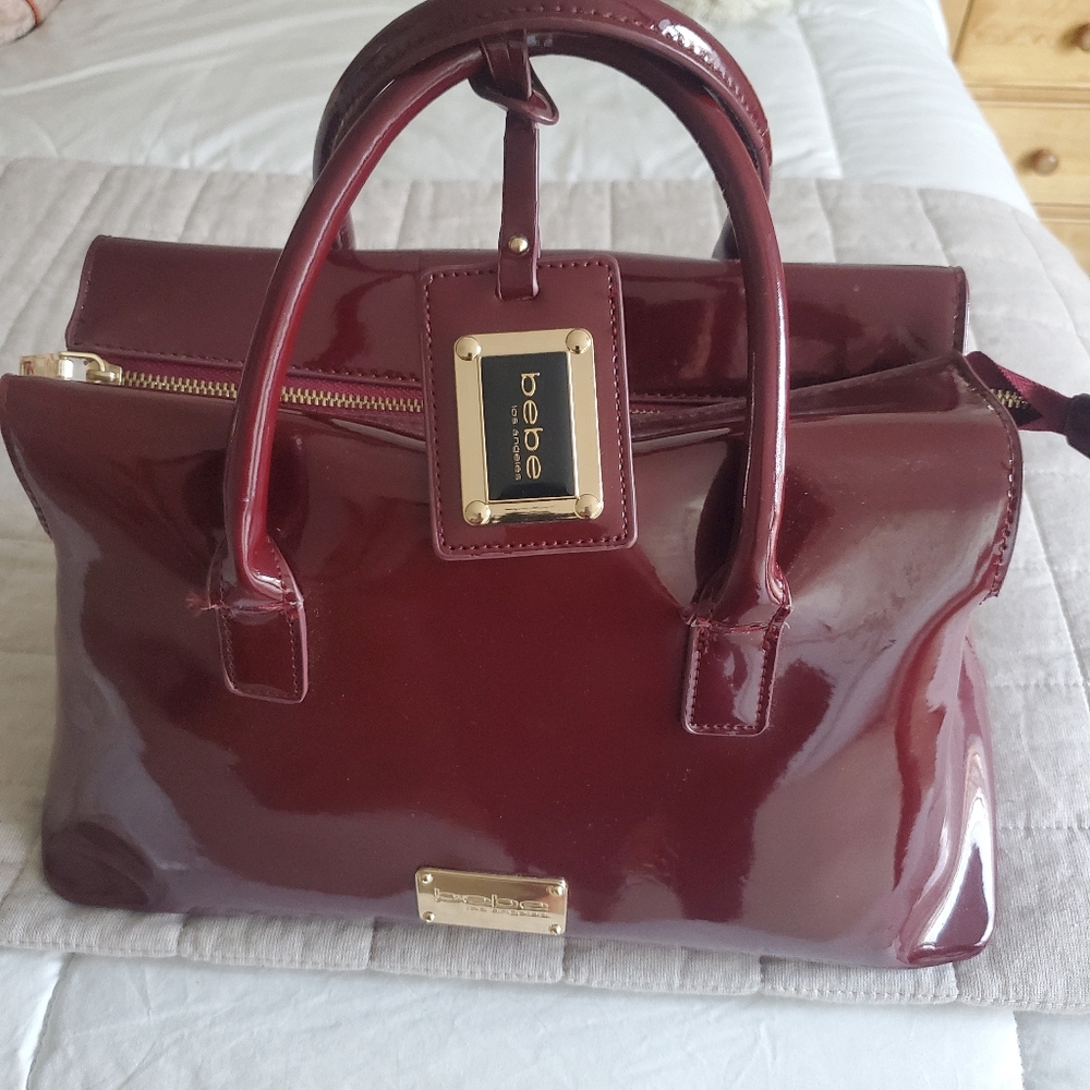 Bebe burgundy patent handbag brand new